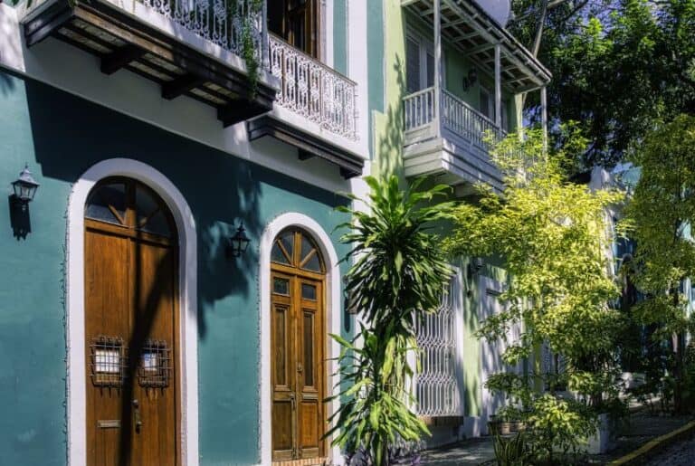 green building on Old San Juan with trees outside. best things to do in old san juan