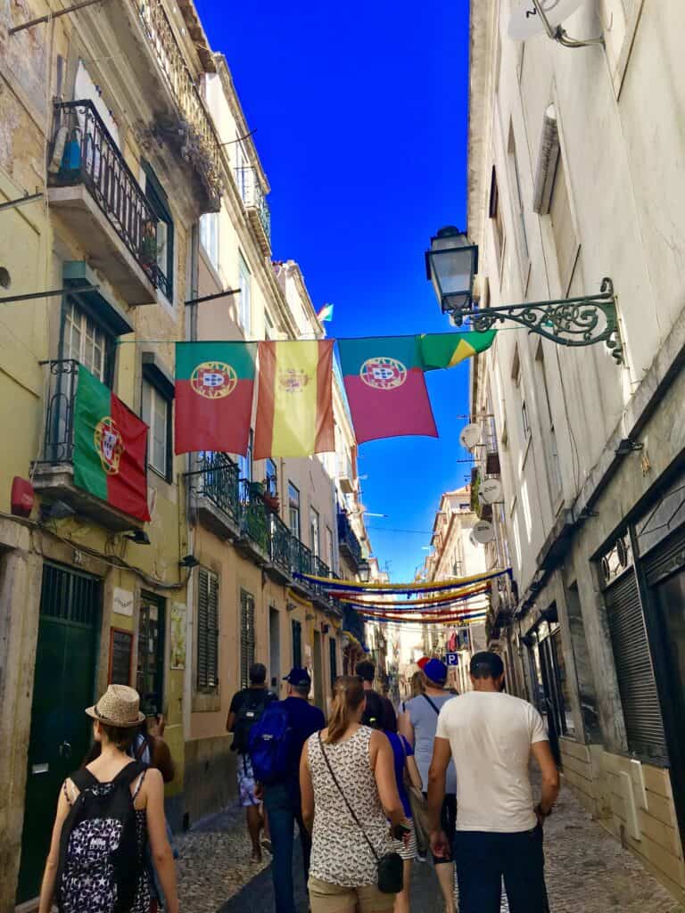 People walking through the streets in Lisbon. 